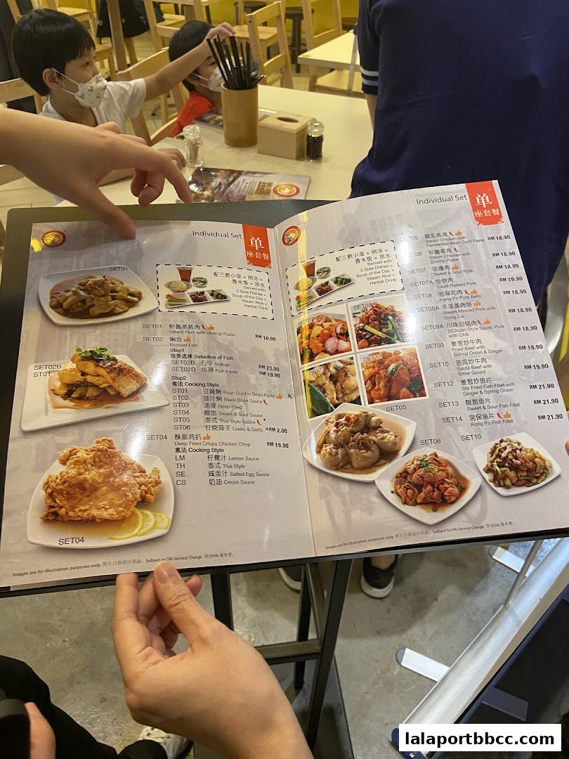 A menu from Sai Kee Restaurant LaLaport BBCC showing individual sets with food items and prices.