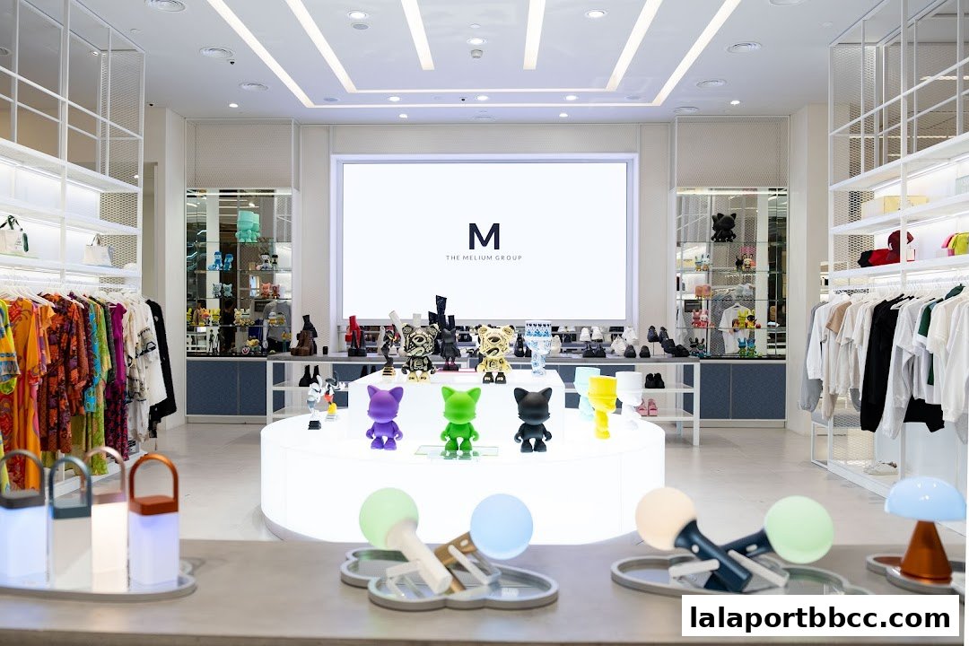 Interior view of a modern retail store showcasing clothing, designer toys, and accessories.