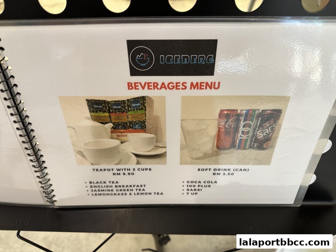 A menu page from Iceberg LaLaport featuring beverages like tea and soft drinks.