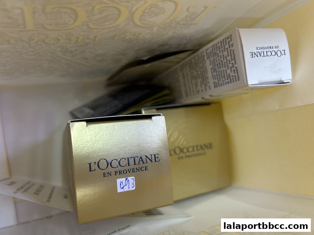 A close-up view of L'Occitane En Provence products inside a shopping bag.