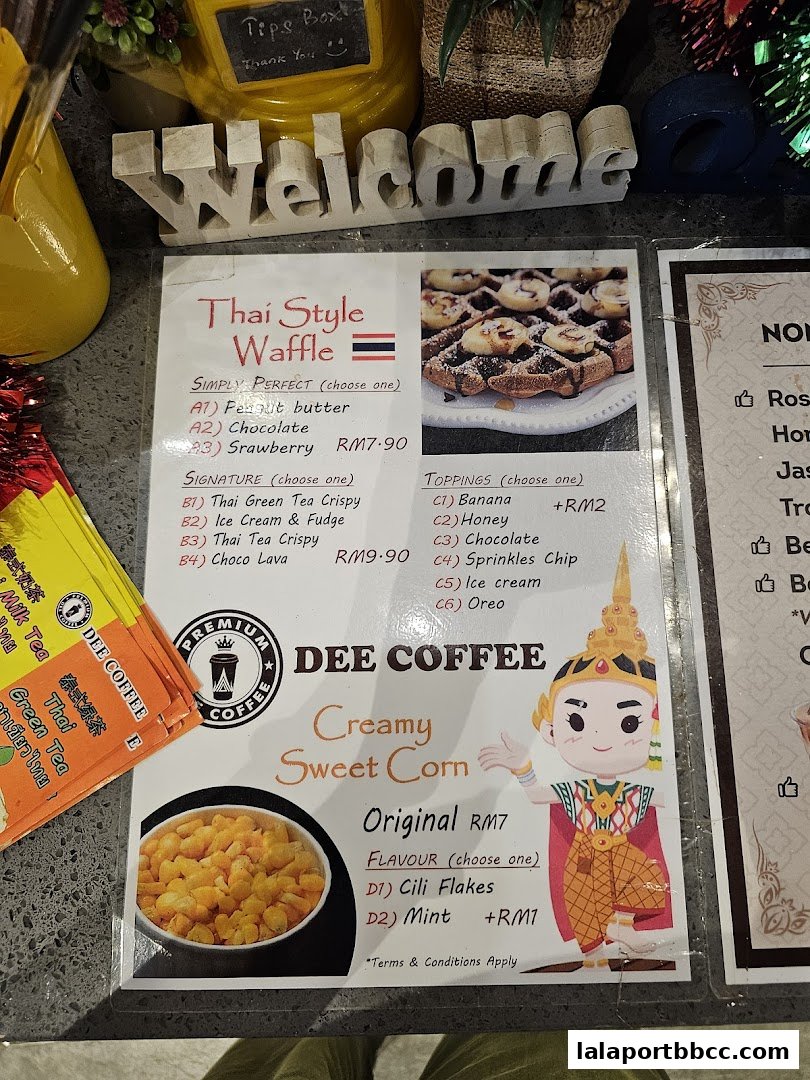 A menu from Dee Coffee featuring Thai Style Waffles and Creamy Sweet Corn.