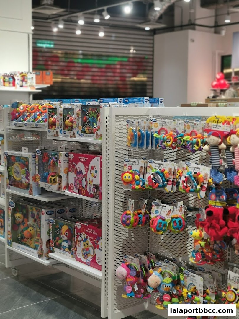 Shelves filled with colorful baby and toddler toys, neatly packaged and displayed.
