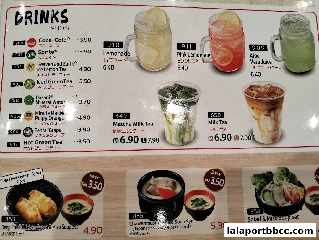 A menu board displaying various drinks and food sets with prices.