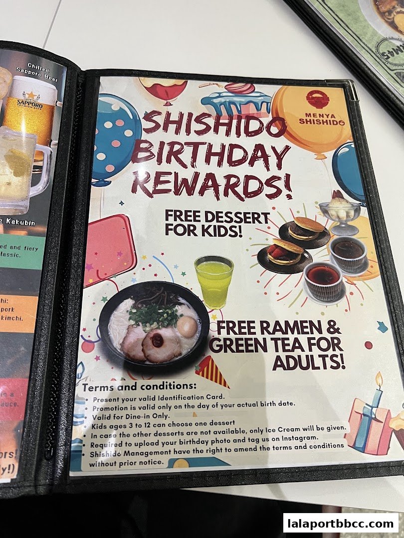 A menu page from Menya Shishido featuring a birthday rewards promotion with free ramen and dessert.
