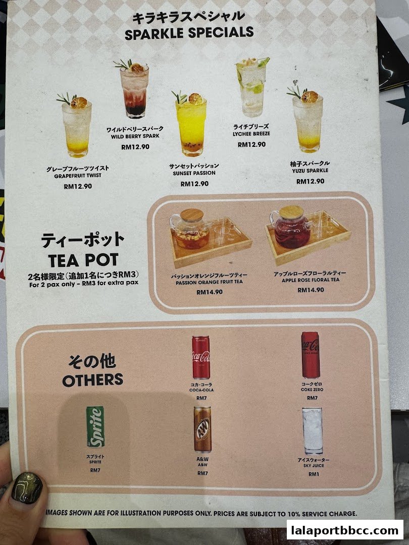 A menu featuring sparkling drinks, tea pots, and other beverages with prices.