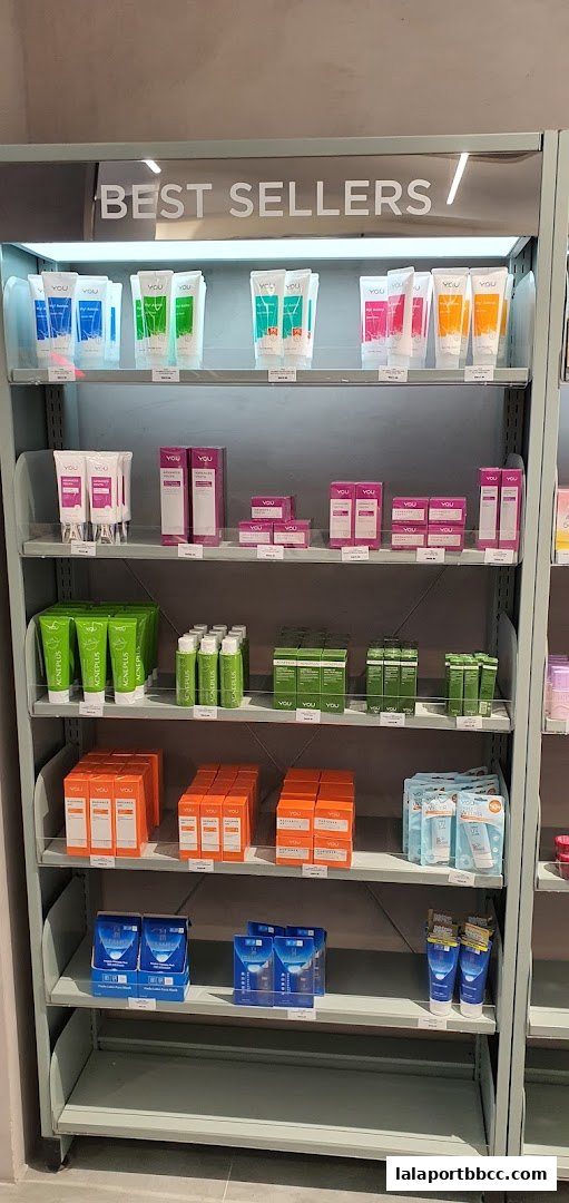 Shelves stocked with various skincare products, including tubes and boxes, labeled 'BEST SELLERS'.