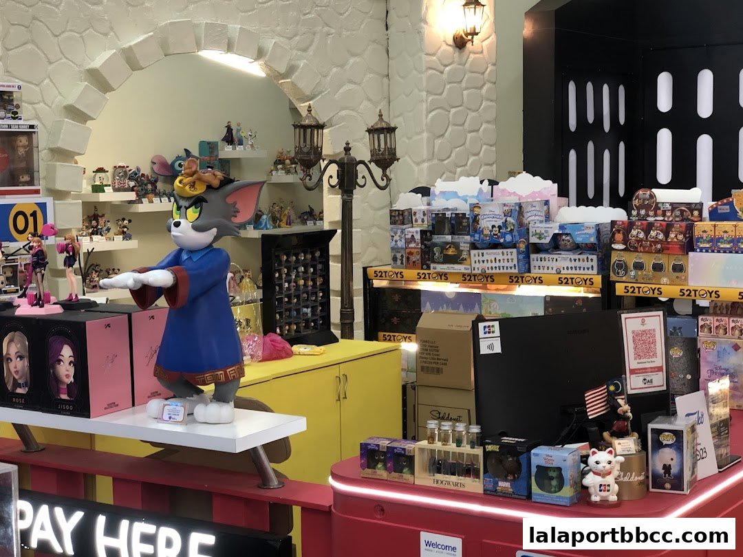 A toy store interior with various character figurines and merchandise displayed.