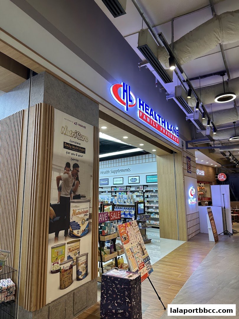 The entrance of Health Lane Family Pharmacy, showcasing health supplements and family nutrition products.