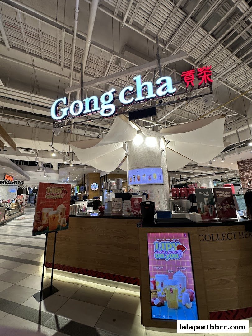 The Gong Cha bubble tea shop counter with its prominent signage and promotional displays.
