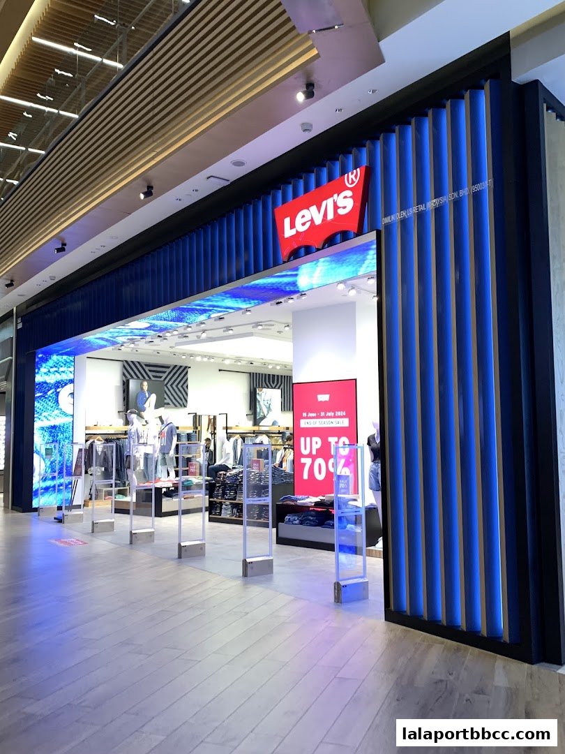 The exterior of a Levi's store with a prominent logo and a sale advertisement.