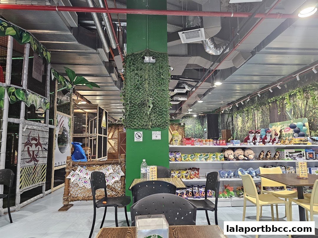 Interior of a children's play area with jungle-themed decor and merchandise.