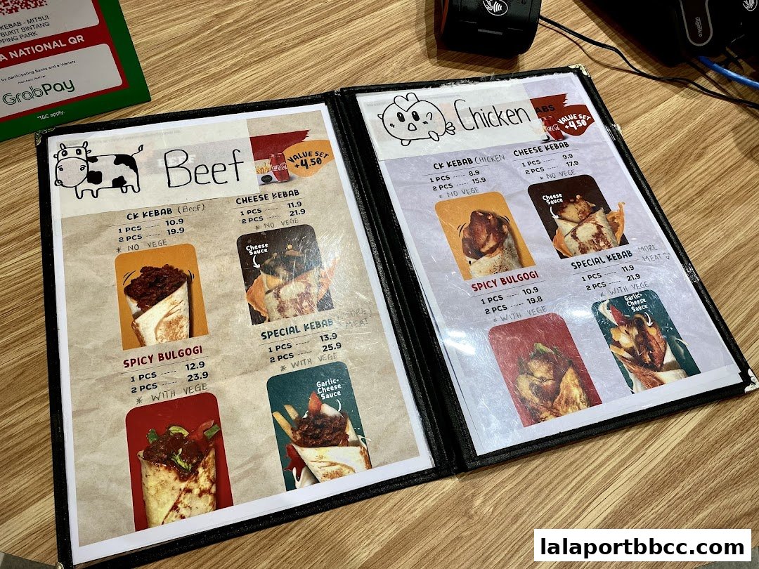 A menu from Container Kebab featuring beef and chicken options with various kebab preparations.