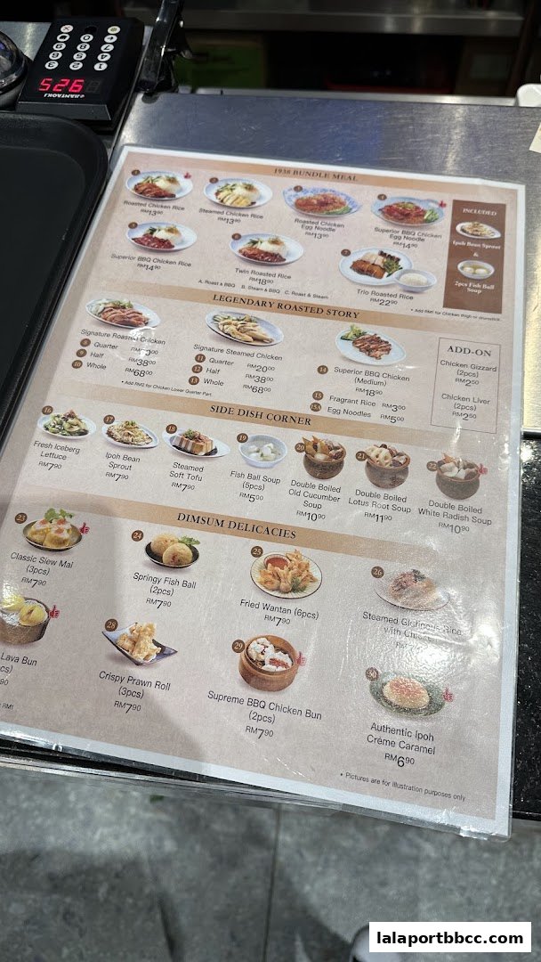 A menu from Nam Heong Chicken Rice featuring various chicken dishes, side dishes, and dim sum.
