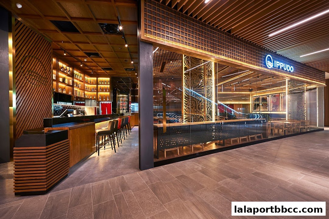 The modern interior and exterior of the IPPUDO ramen restaurant.