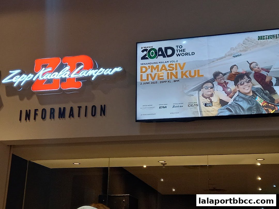The Zepp Kuala Lumpur sign and an advertisement for a D'Masiv concert.