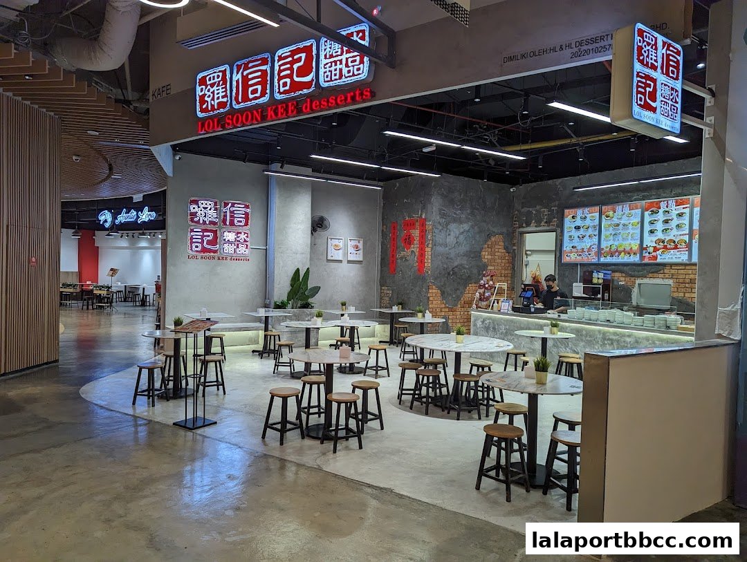The interior of Lol Soon Kee Desserts, a dessert shop with seating and a counter.