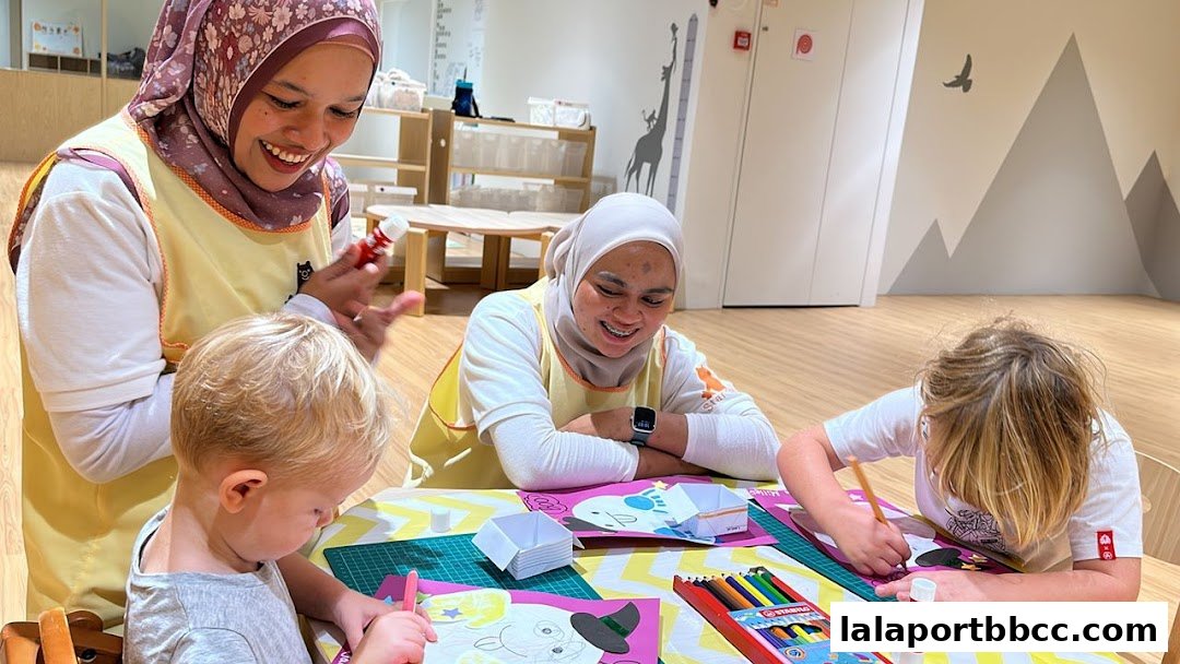 Children and caregivers engage in a fun art and craft activity at a childcare center.