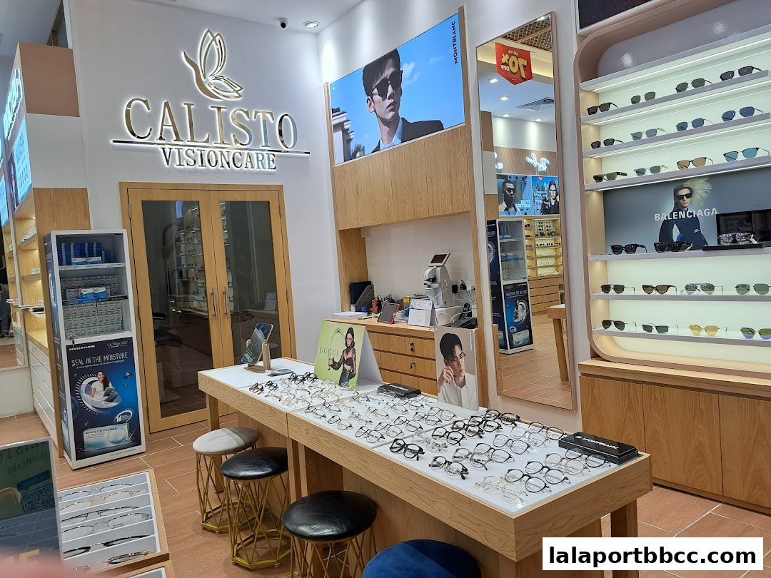 Interior of Calisto Vision Care shop showcasing a wide selection of eyeglasses and contact lenses.
