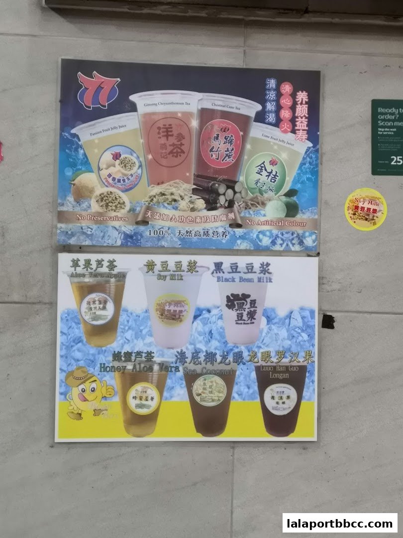 A menu board displaying various beverages with colorful images and descriptions.