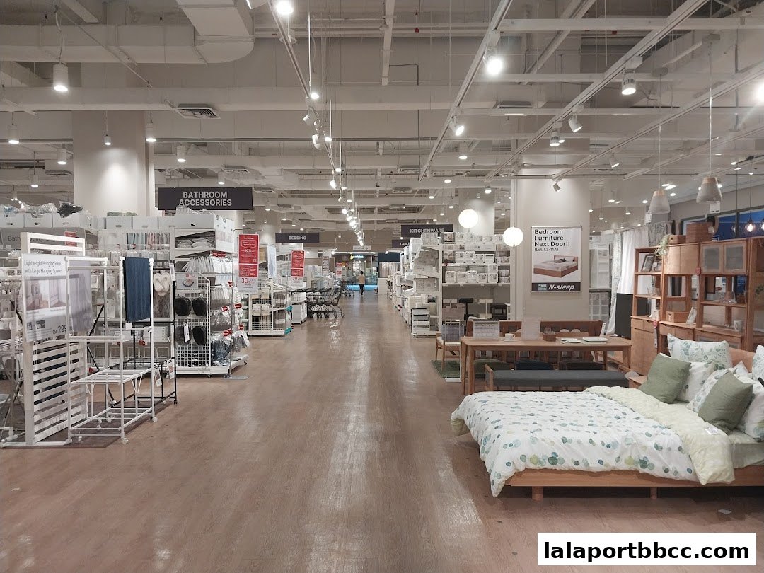 Interior view of a Nitori store showcasing home furnishings, including beds, furniture, and accessories.