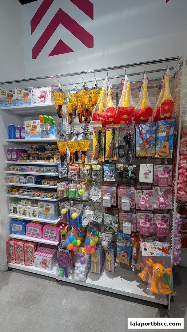 A wide selection of toys and novelty items displayed on shelves in a retail store.