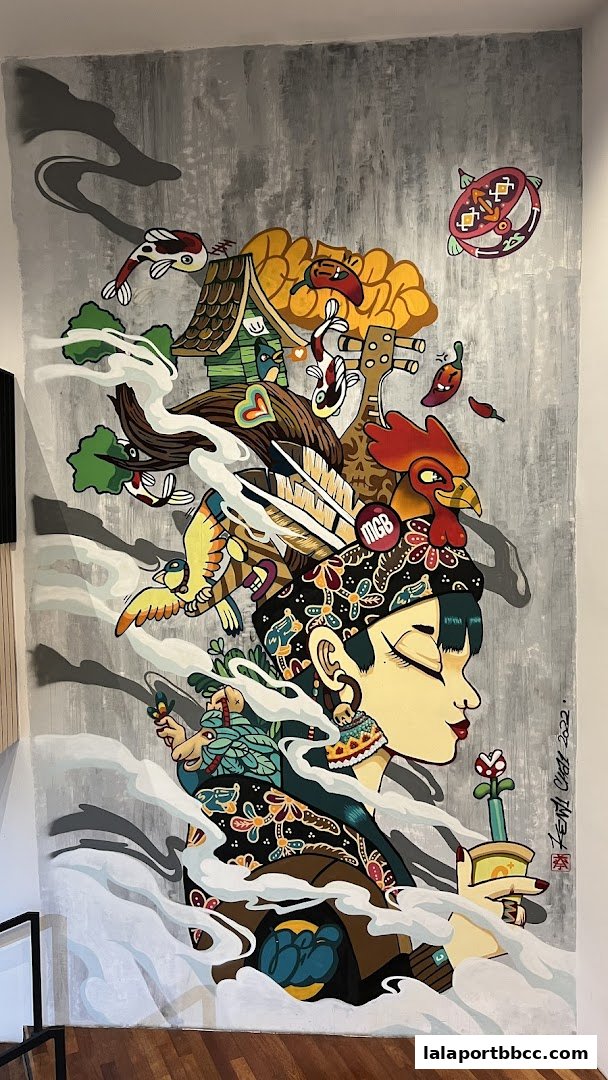 A vibrant mural depicting a woman with intricate cultural elements and fantastical creatures.