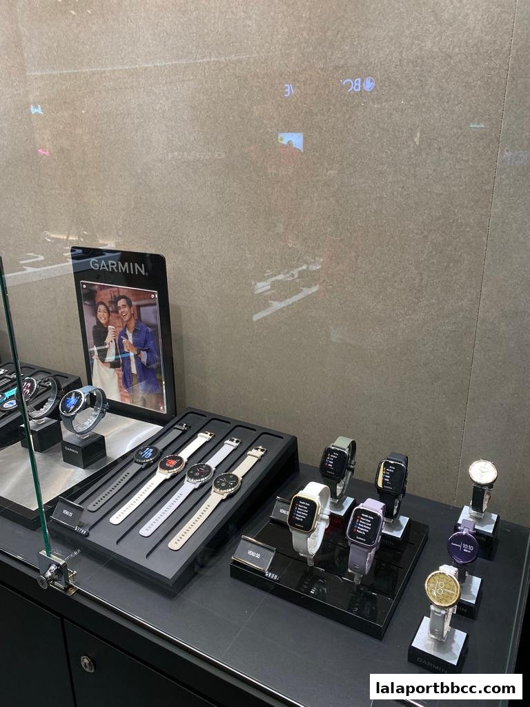 A display of various Garmin smartwatches, showcasing different models and colors.