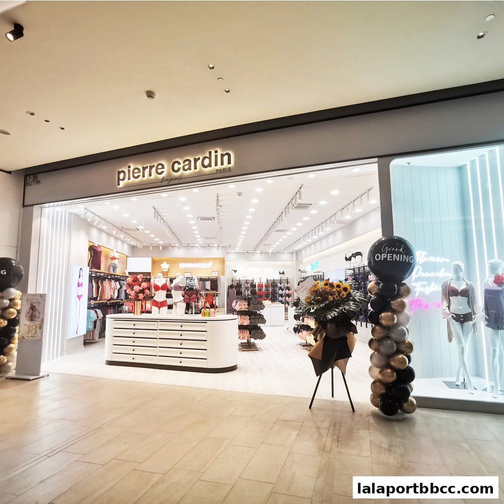 The entrance of a Pierre Cardin Lingerie store, showcasing lingerie displays and mannequins.