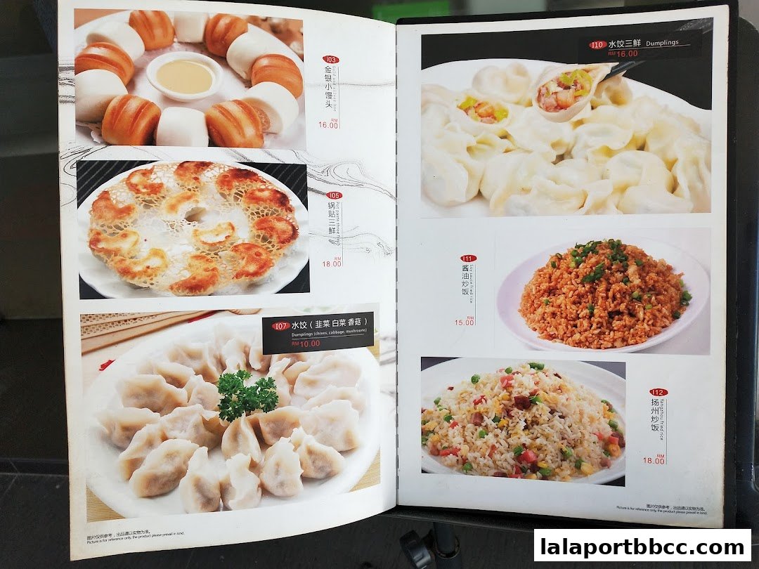 A menu from Xiao Nan Guo Xiang Cai Guan featuring various Chinese dishes like dumplings and fried rice.