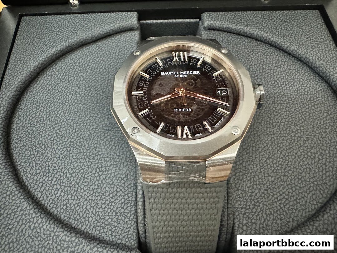 A close-up shot of a Baume & Mercier Riviera watch in its presentation box.
