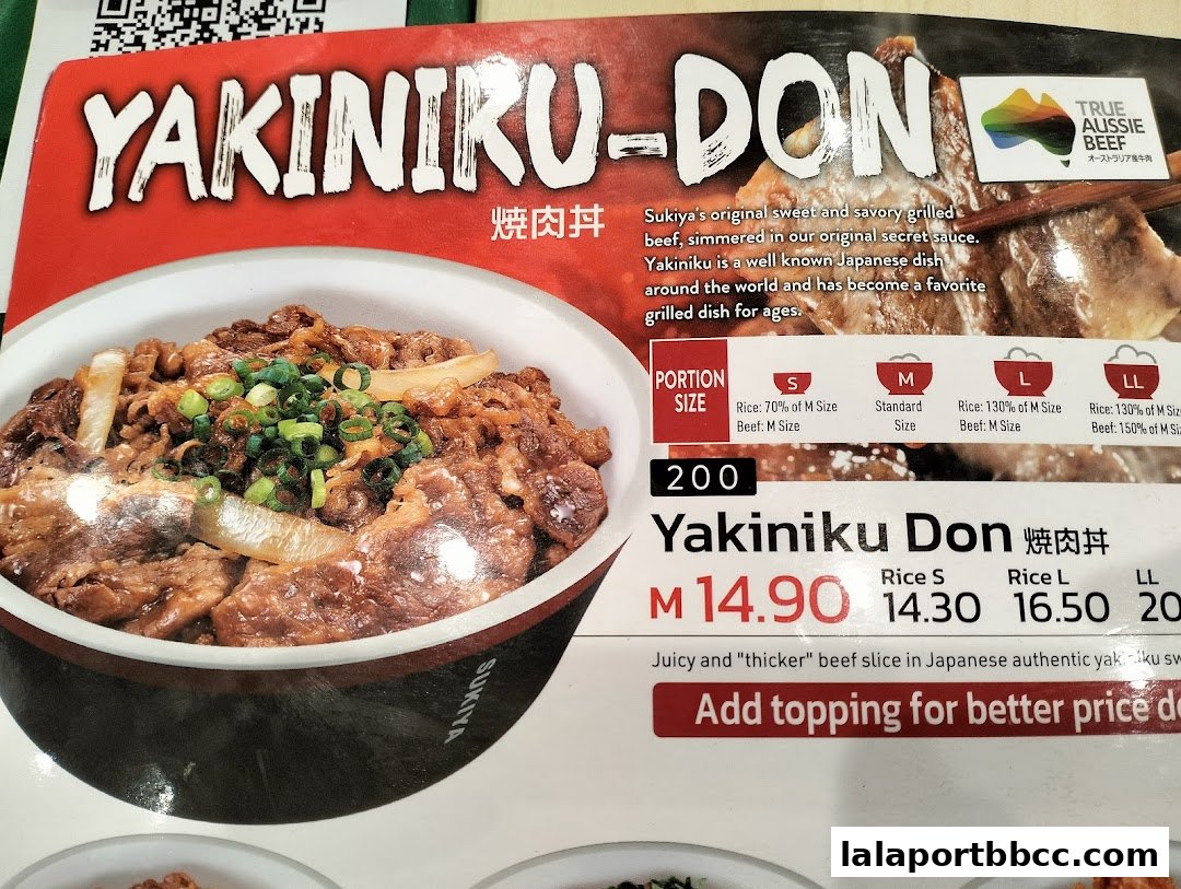 A menu display for Sukiya's Yakiniku Don, featuring portion sizes and prices.