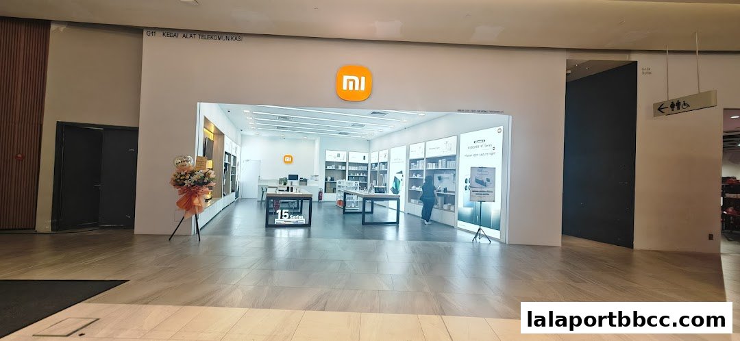 The entrance to a modern Xiaomi store showcasing various electronic products and displays.