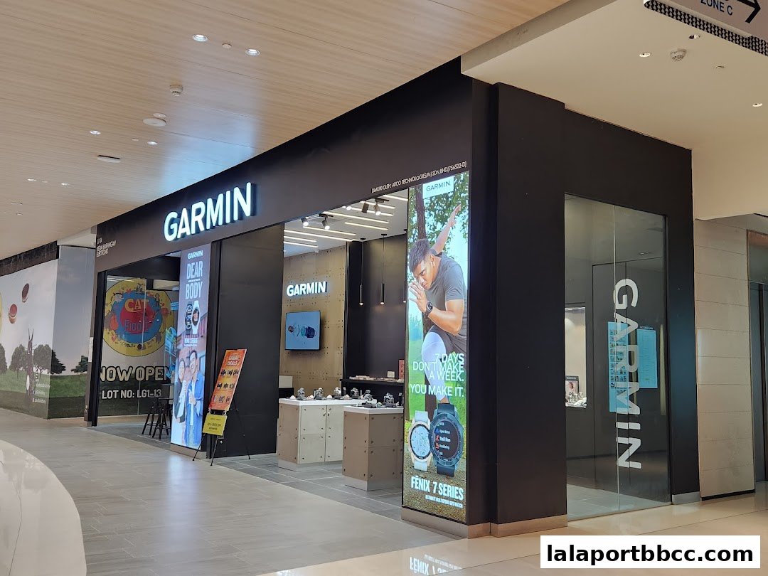 The exterior of a modern Garmin store with prominent signage and product displays.