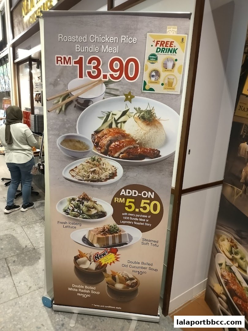 A promotional banner for Nam Heong Chicken Rice featuring a bundle meal and add-on options.