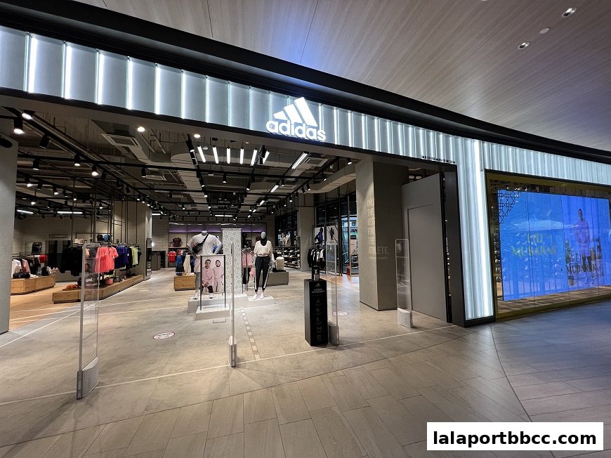 The entrance to the Adidas Originals store at LaLaport Bukit Bintang City Centre, showcasing apparel and displays.