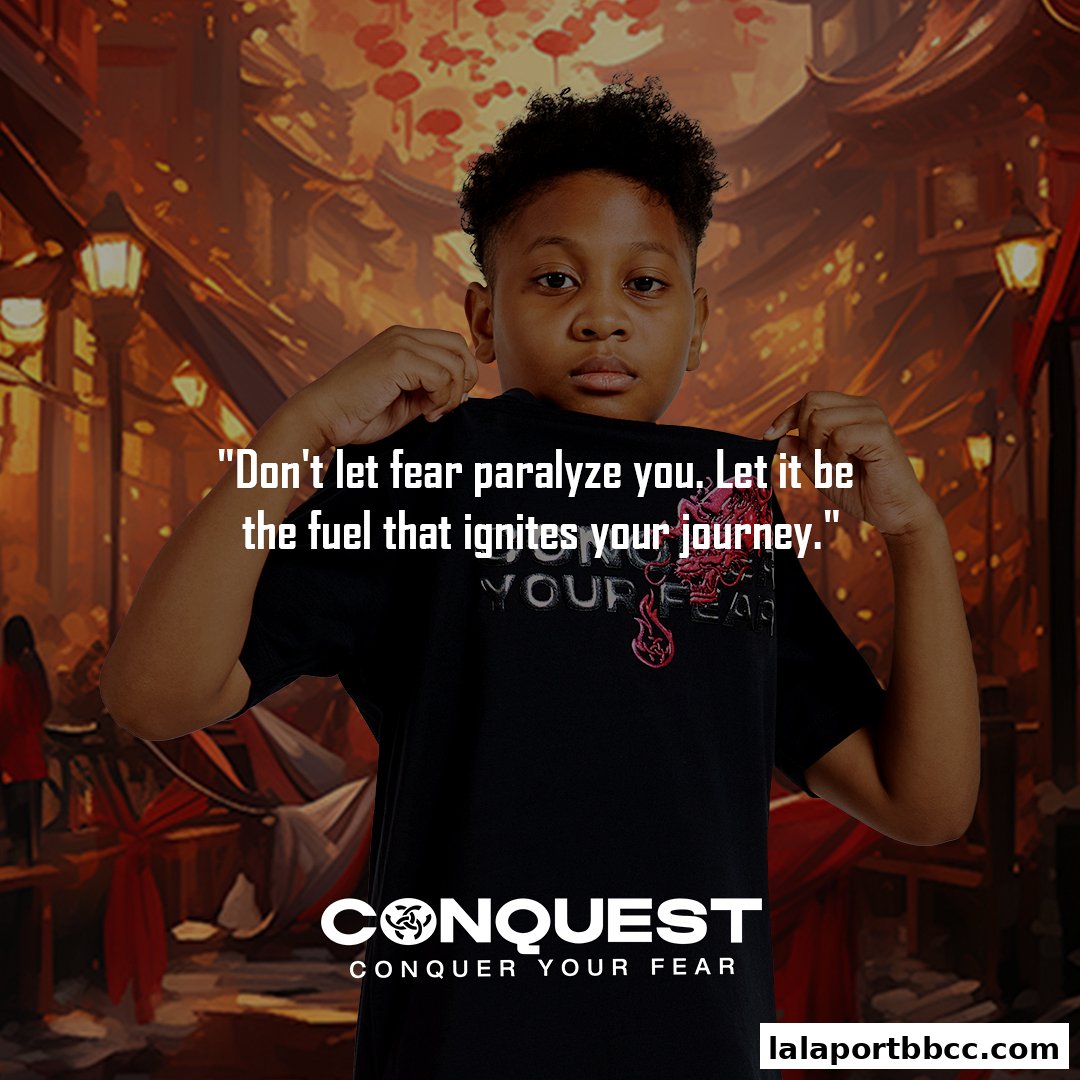 A young person displays a t-shirt with an inspirational quote and the CONQUEST logo.