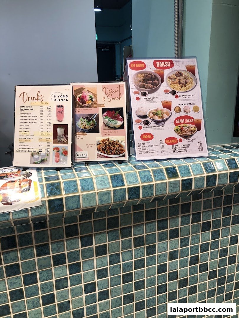 Menus displaying drinks, desserts, snacks, and bakso dishes with prices.