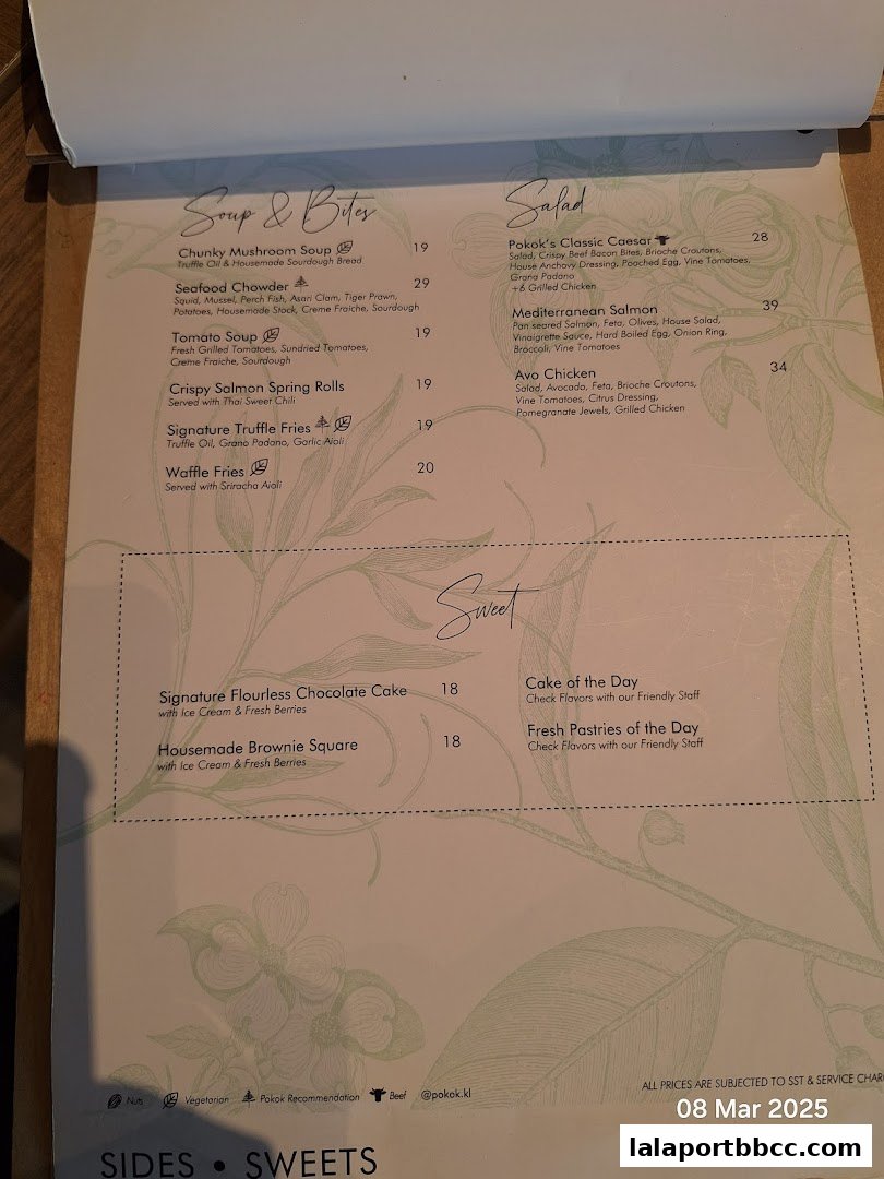 A menu from POKOK LaLaport featuring soups, salads, and desserts.