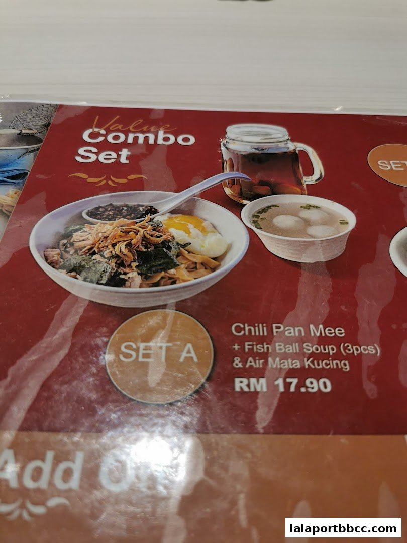 A menu item featuring Chili Pan Mee, Fish Ball Soup, and Air Mata Kucing.