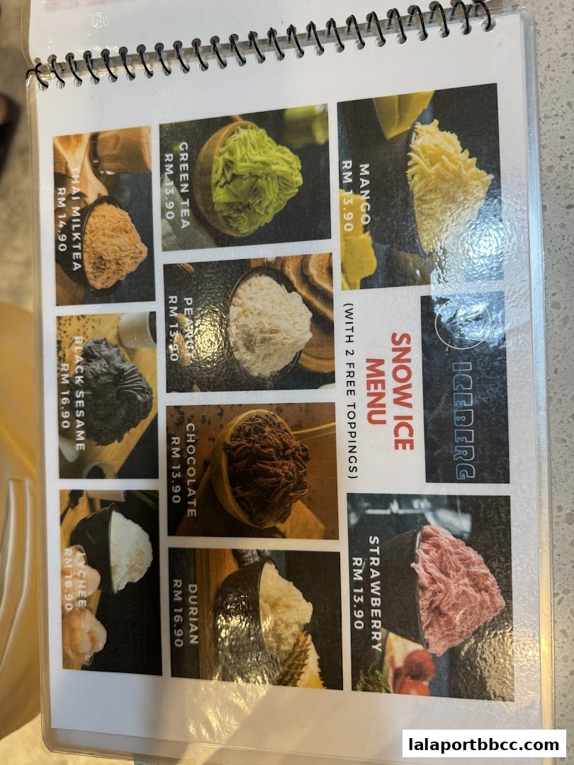 A menu page showcasing various flavors of snow ice desserts with prices.