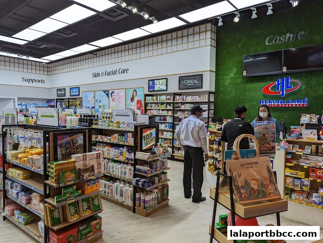 Interior view of Health Lane Family Pharmacy with shelves stocked with health and beauty products.