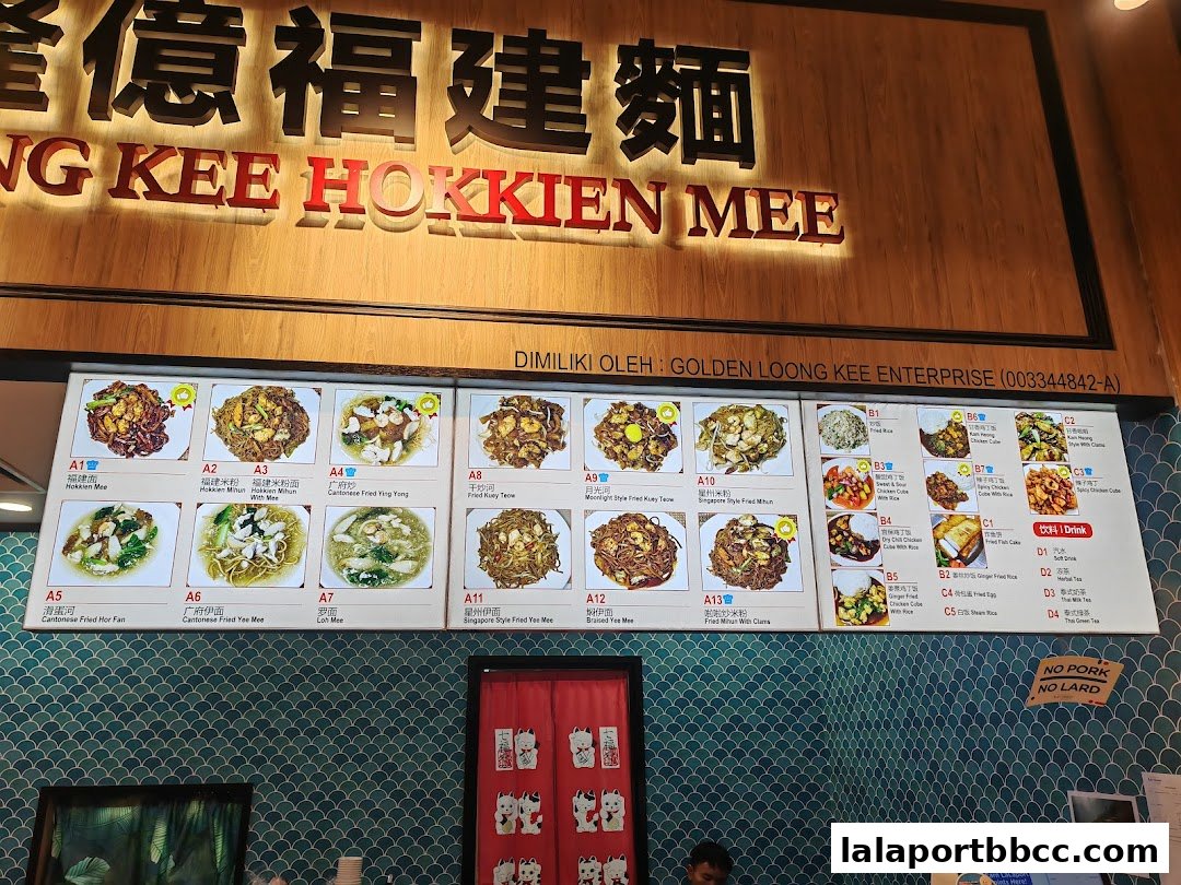 A menu board displaying various Hokkien Mee dishes and other food items with pictures.