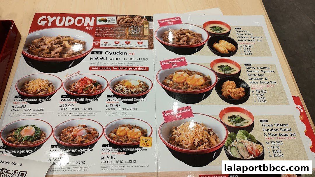 A menu from Sukiya featuring various Gyudon bowls and sets with prices.