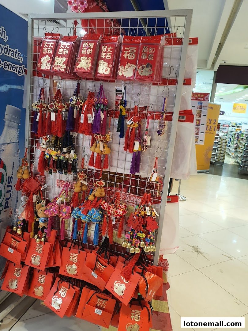 A display of red festive decorations, including red envelopes and hanging ornaments, likely for a holiday.
