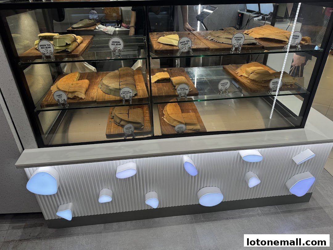 A display case filled with various flavors of pancakes at Munchi Pancakes.