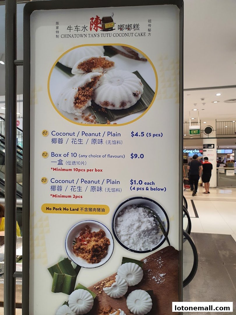 A menu board for Chinatown Tan's Tutu Coconut Cake, showcasing different flavors and prices.