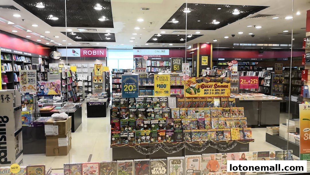 Interior view of a Popular bookstore with shelves of books and promotional displays.