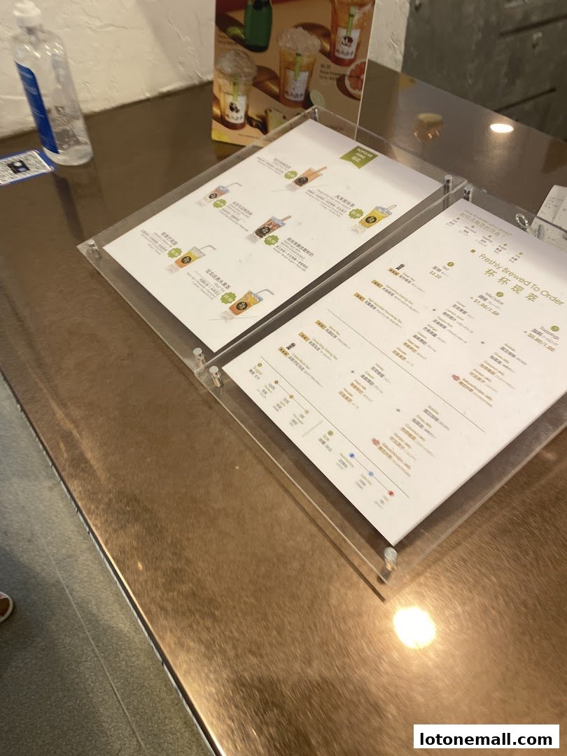 A menu displaying various bubble tea drinks with prices and descriptions.