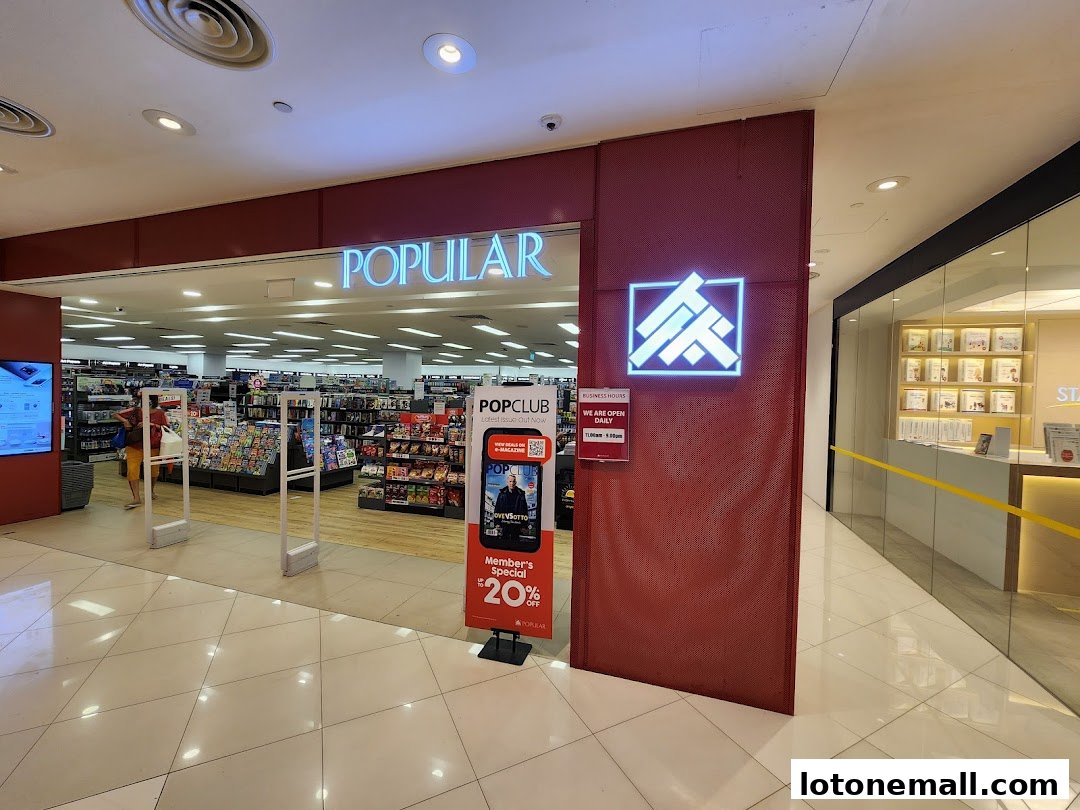 The entrance to POPULAR Bookstore, showcasing its bright interior and promotional signage.
