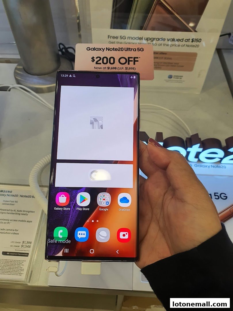 A person holds a Samsung Galaxy Note 20 Ultra 5G phone with a promotional offer displayed.